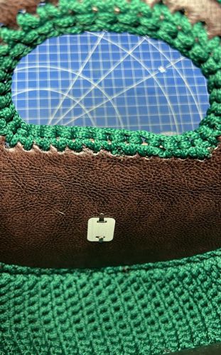 Attach the second part of the clasp to the front panel.