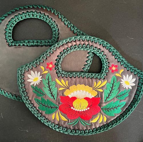 Crochet in the holes along all edges of both panels.