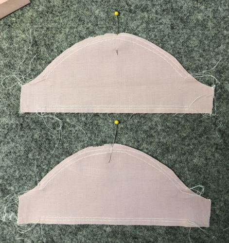 Organza sleeves with gathering threads.