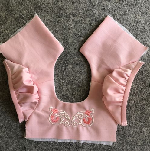 Bodice with the sleeves attached. Right side.