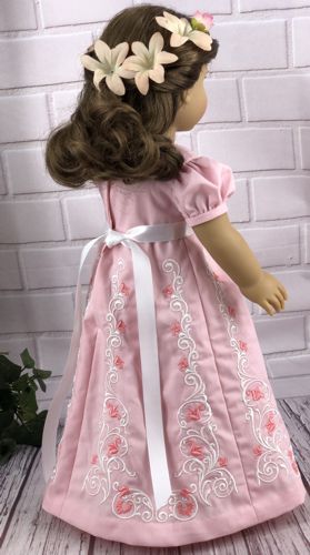 The finished dress on the doll.