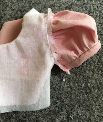 Clip the seam allowance of the armhole