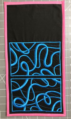 Finish all edges of the purse with the bias tape.