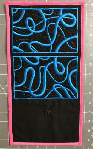 Sew the "female" part of the snap to the blank panel.
