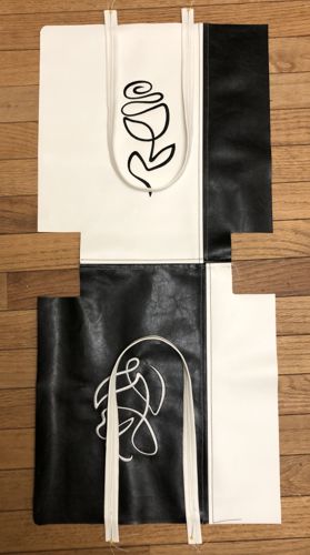 Pin the handles to the upper edges of the bag, with ends protruding 1" beyond the edges of the bag.