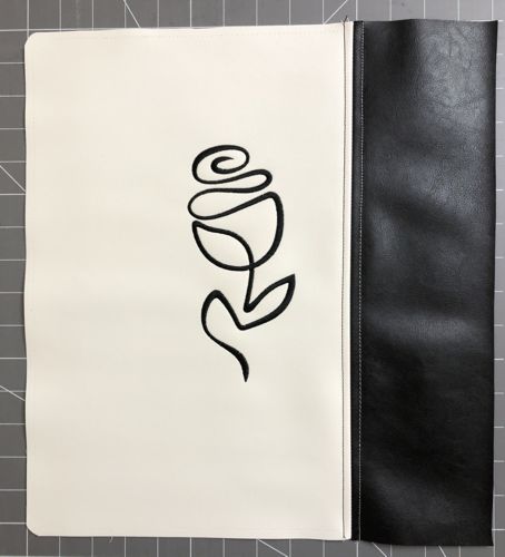Open the seam and top-stitch on both sides.