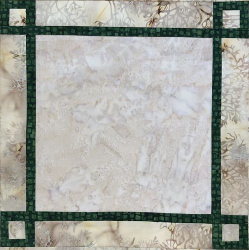 Sew the new borders to the left and right edges of the working piece.