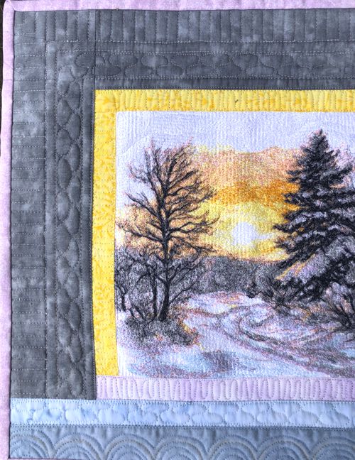 A close-up of the embroidery and quilting stitches.