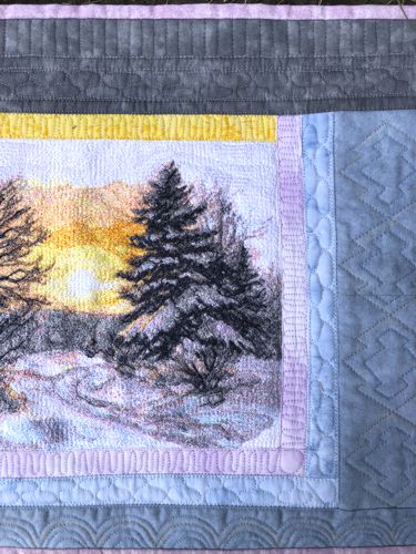 A close-up of the embroidery and quilting stitches.