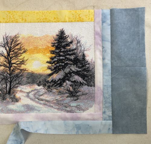 A light gray strip is attached to the right edge of the piece.