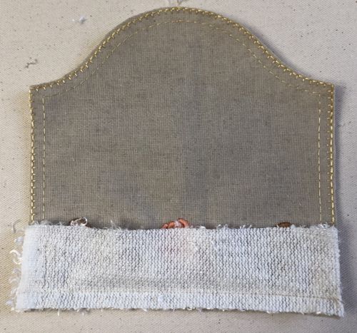 A strip of faux fur along the sleeve hem.