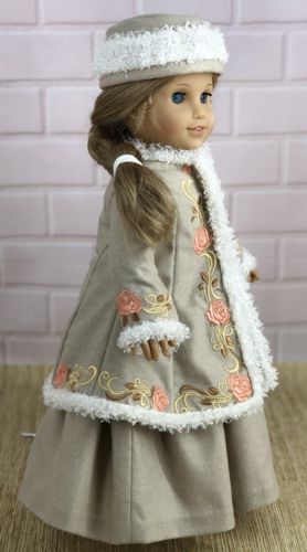 A 18-inch doll in a winter coat.