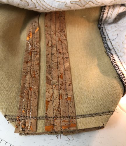 To shape the bottom, fold the bottom of the bag so that the bottom and the side seams align. Pin. Stitch.