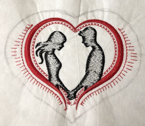 A heart shape is on the back of one of the stitch-outs